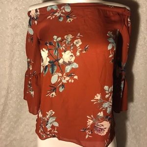 Off-shoulder floral shirt